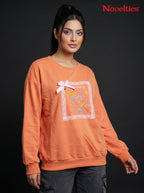 Coral Peach Graphic Bow Sweatshirt