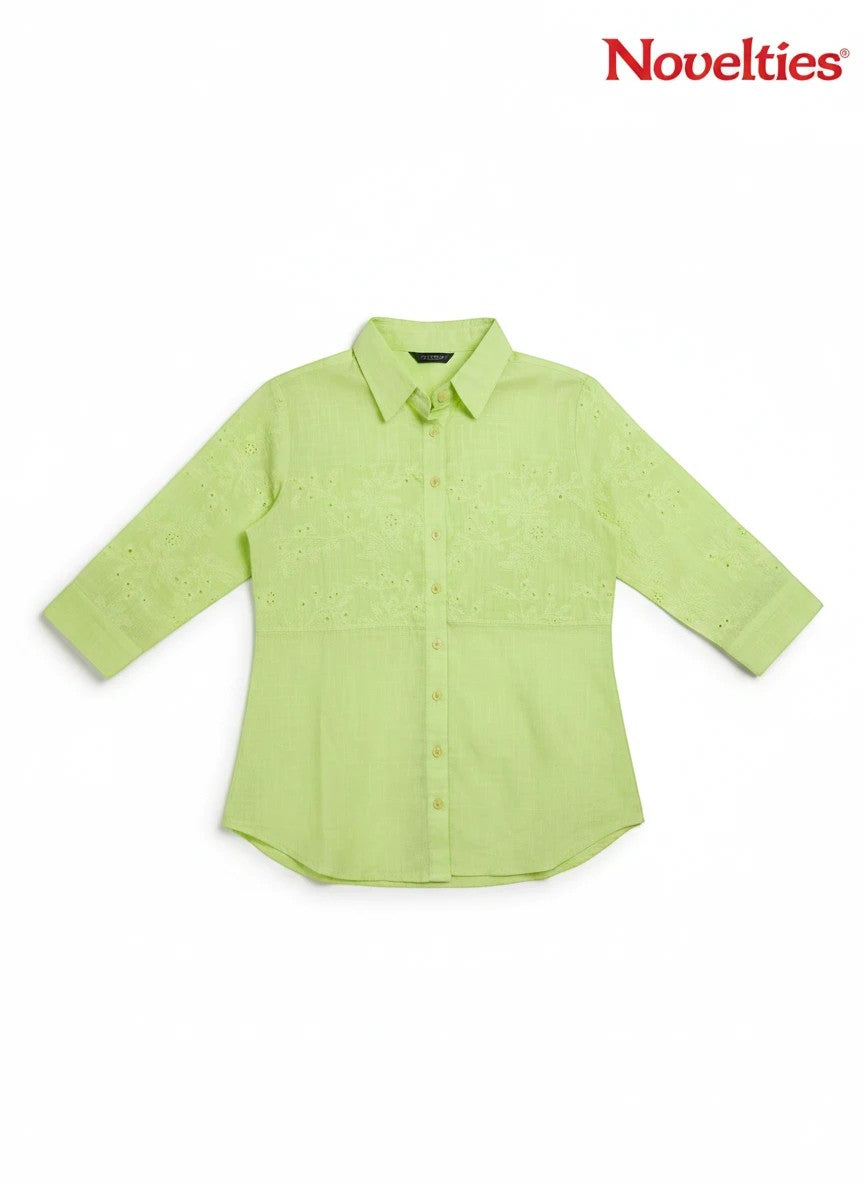 Novelties® lime green button-down shirt with floral schiffli embroidery on the bodice and three-quarter sleeves.