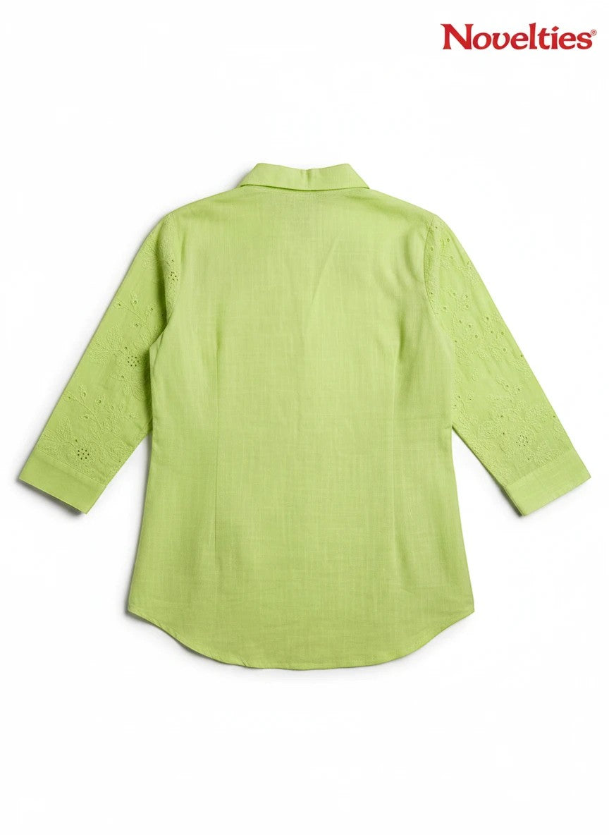 Novelties® lime green button-down shirt featuring delicate tone-on-tone floral schiffli embroidery on the sleeves.