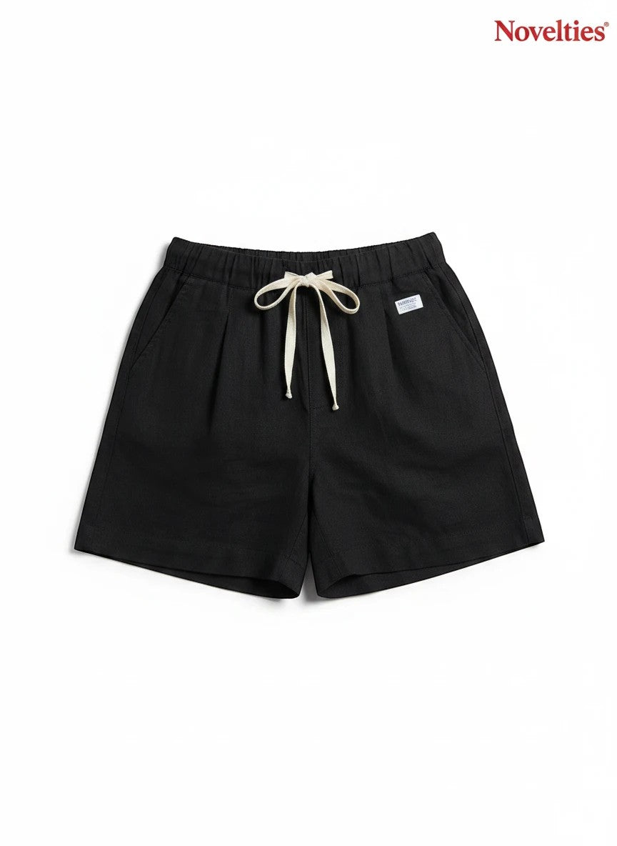 Novelties® black casual shorts with an elastic waistband, adjustable drawstring, and a relaxed, comfortable fit.