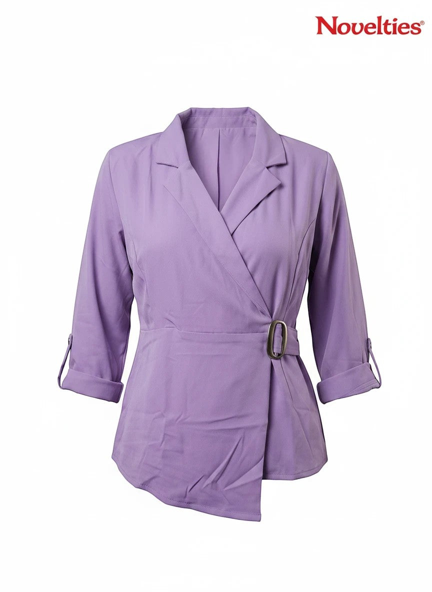 Novelties® lavender wrap-style blazer top with lapel collar, 3/4 roll-tab sleeves, and metallic waist buckle.
